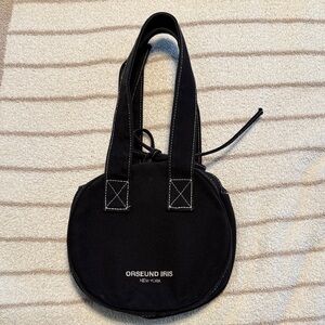 Orseund Iris Black Circle Bag with White Stitching